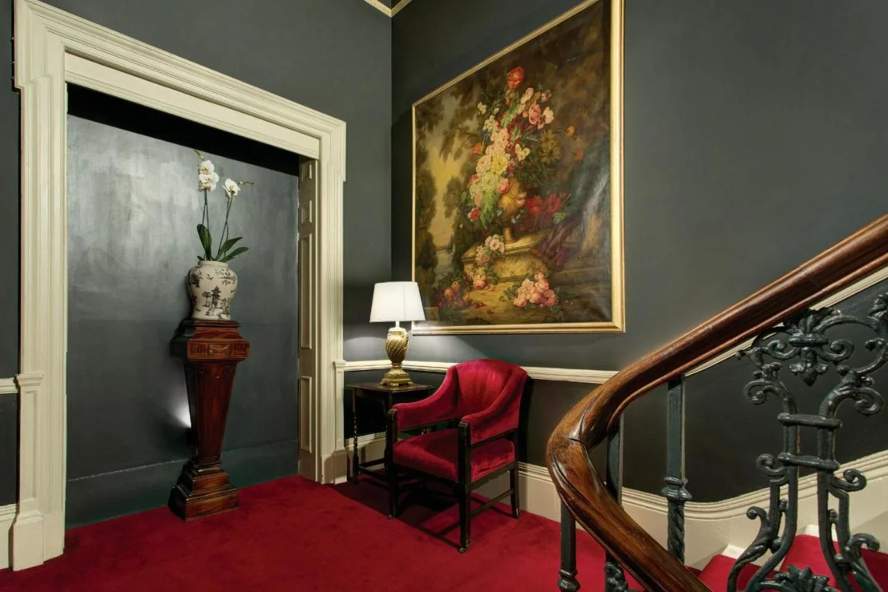 Antique-styled hallway with painting at The Gore London hotel